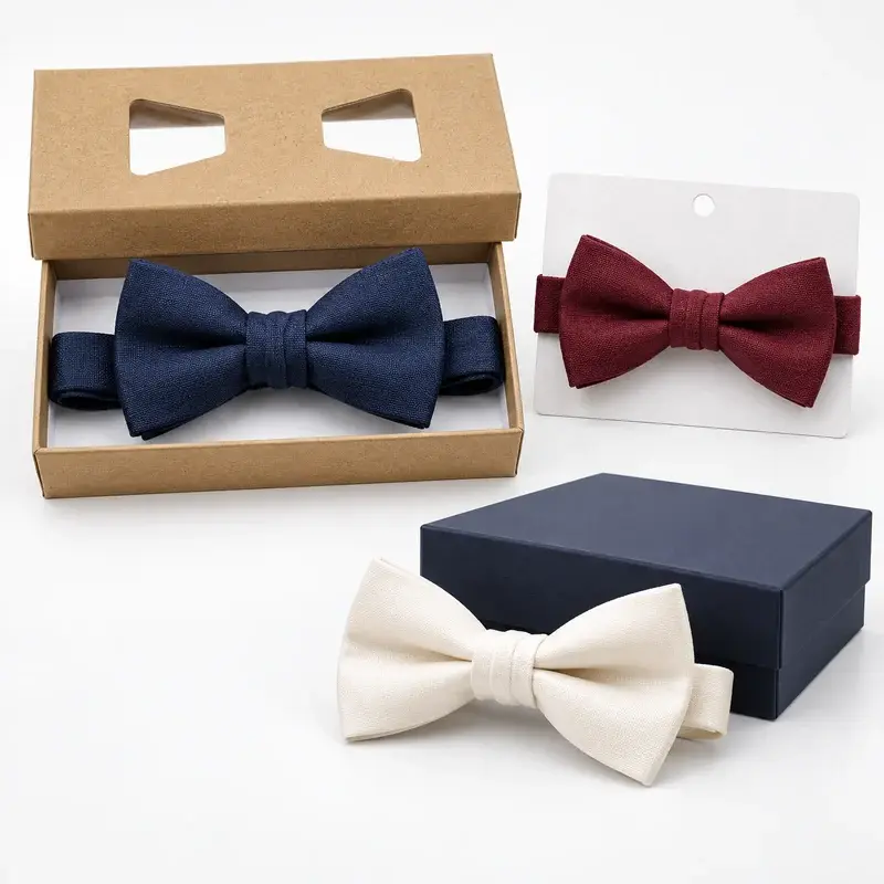 Private label bow ties arranged with gift boxes and a blank retail card.