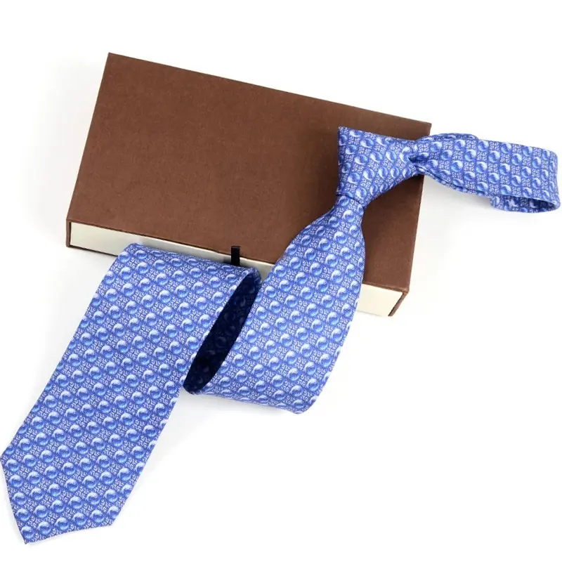 Blue patterned necktie displayed with a presentation box