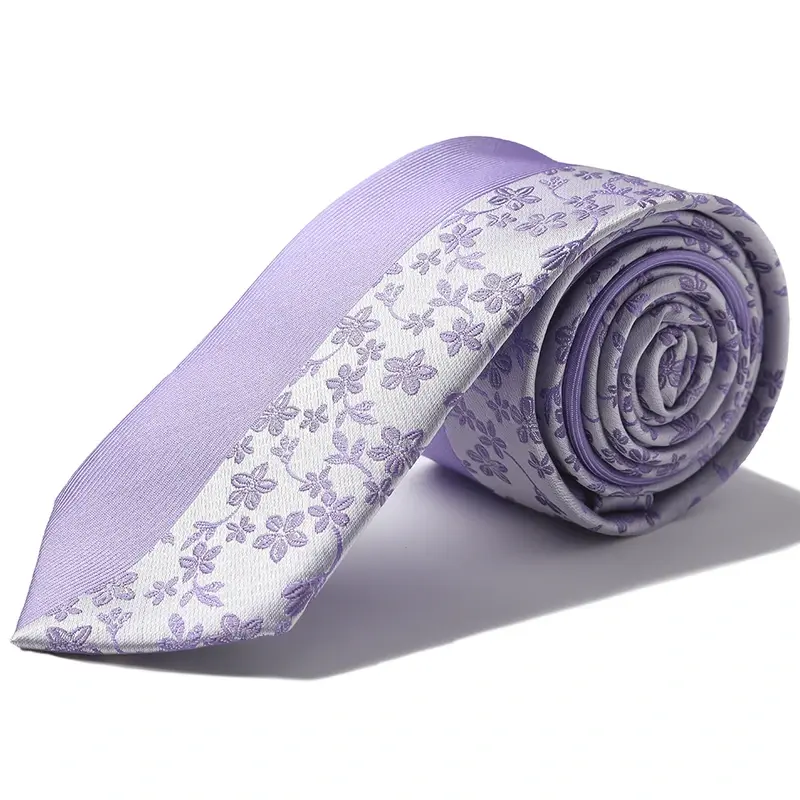 Rolled lavender tie with a pale floral border pattern.