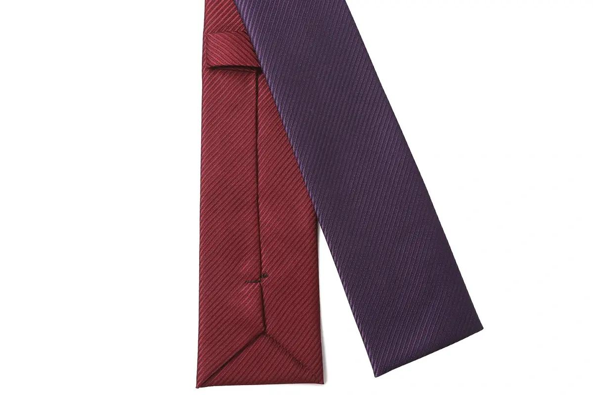 Back views of burgundy and purple ties with two variants and center seams.