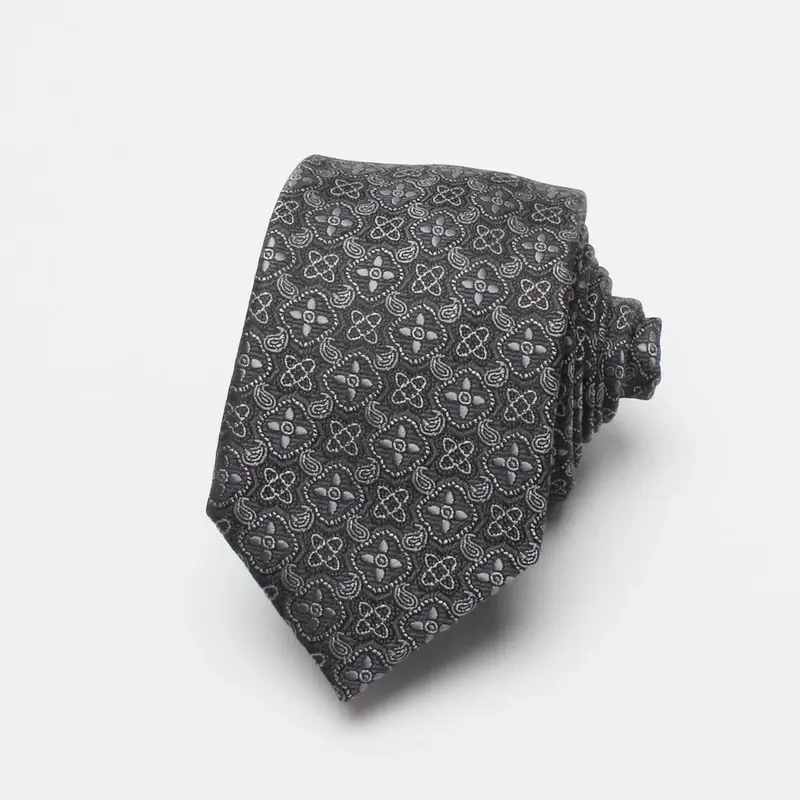 Gray patterned necktie on white background