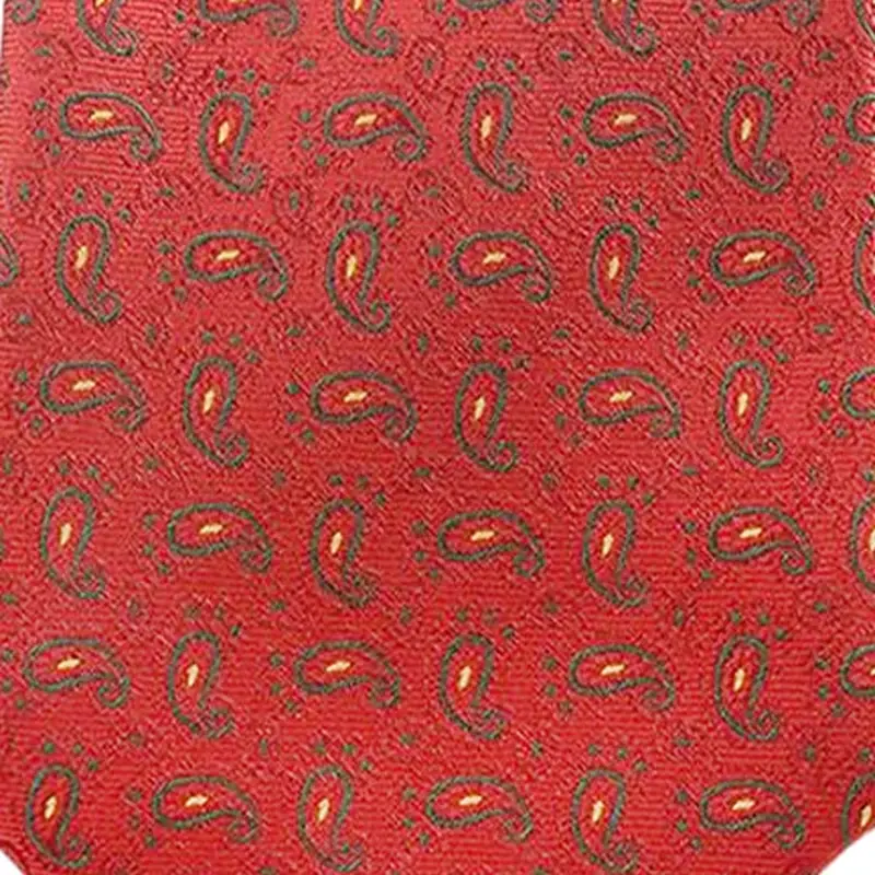 Close-up of red necktie with small repeating motifs
