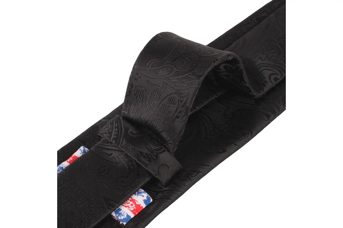 A black paisley tie with the folded blade, keeper loop and inner details.